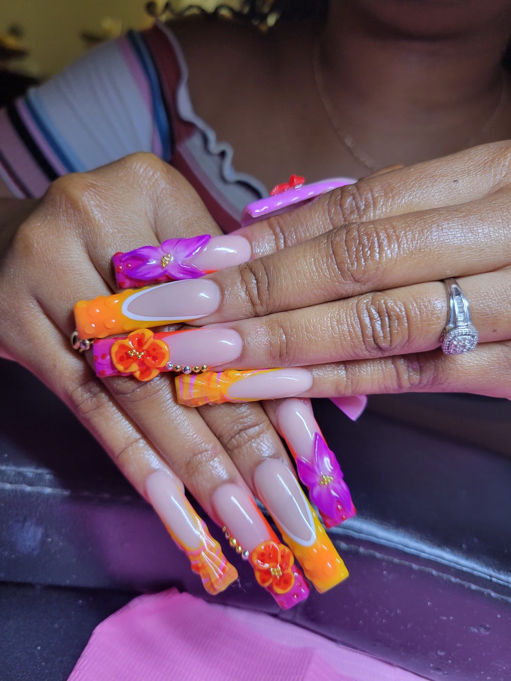 Extra long coffin nails in hot pink and orange with 3D hibiscus flowers